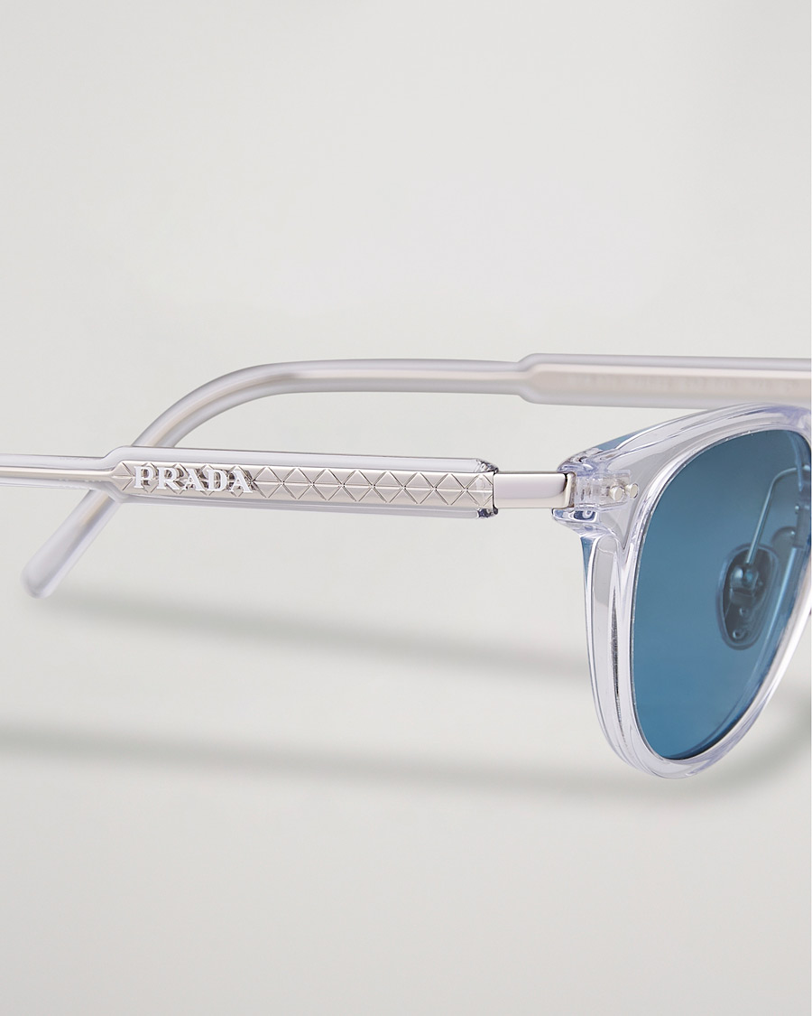 Herren | Gebogene Sonnenbrillen | Prada Eyewear | 0PR 17YS Polarized Sunglasses Transparent