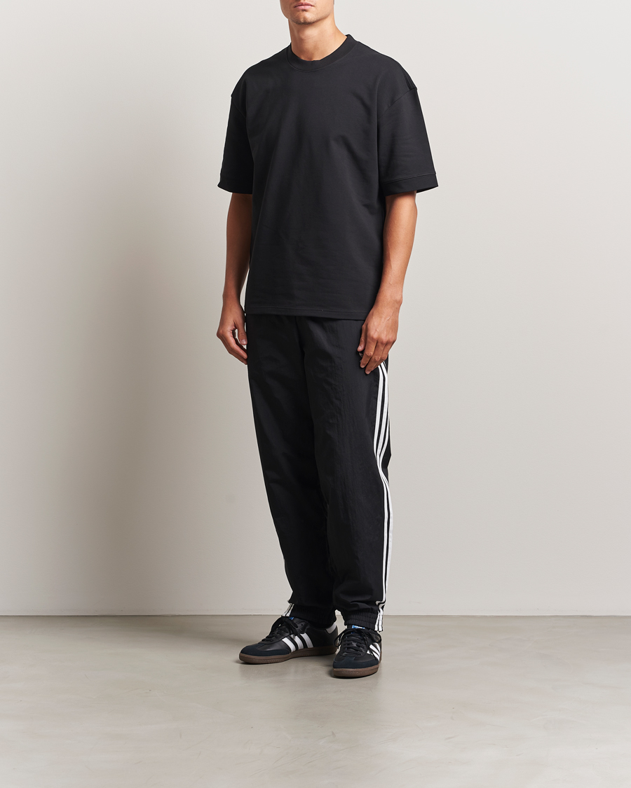 adidas Originals Firebird Track Pants Black/White bei Care of Carl