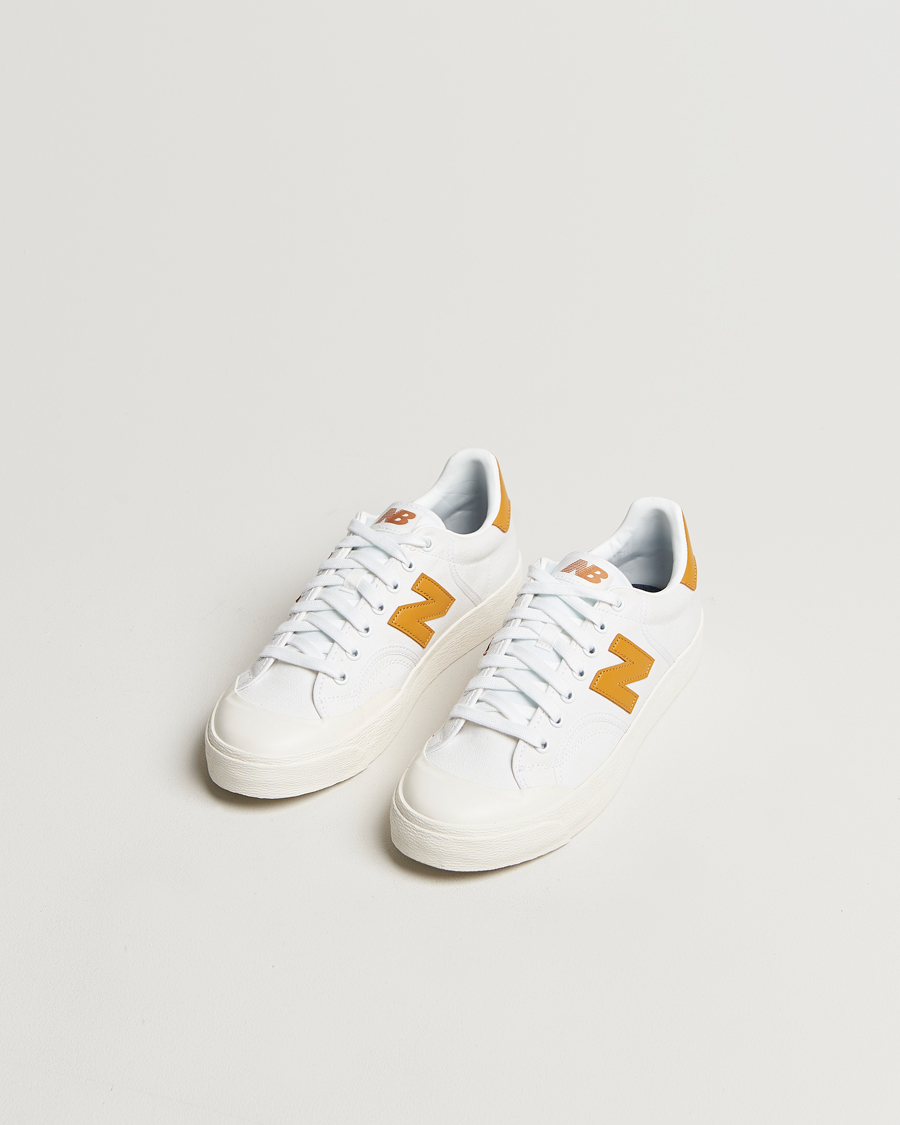 Herren | New Balance B100 Sneakers White/Yellow | New Balance | B100 Sneakers White/Yellow