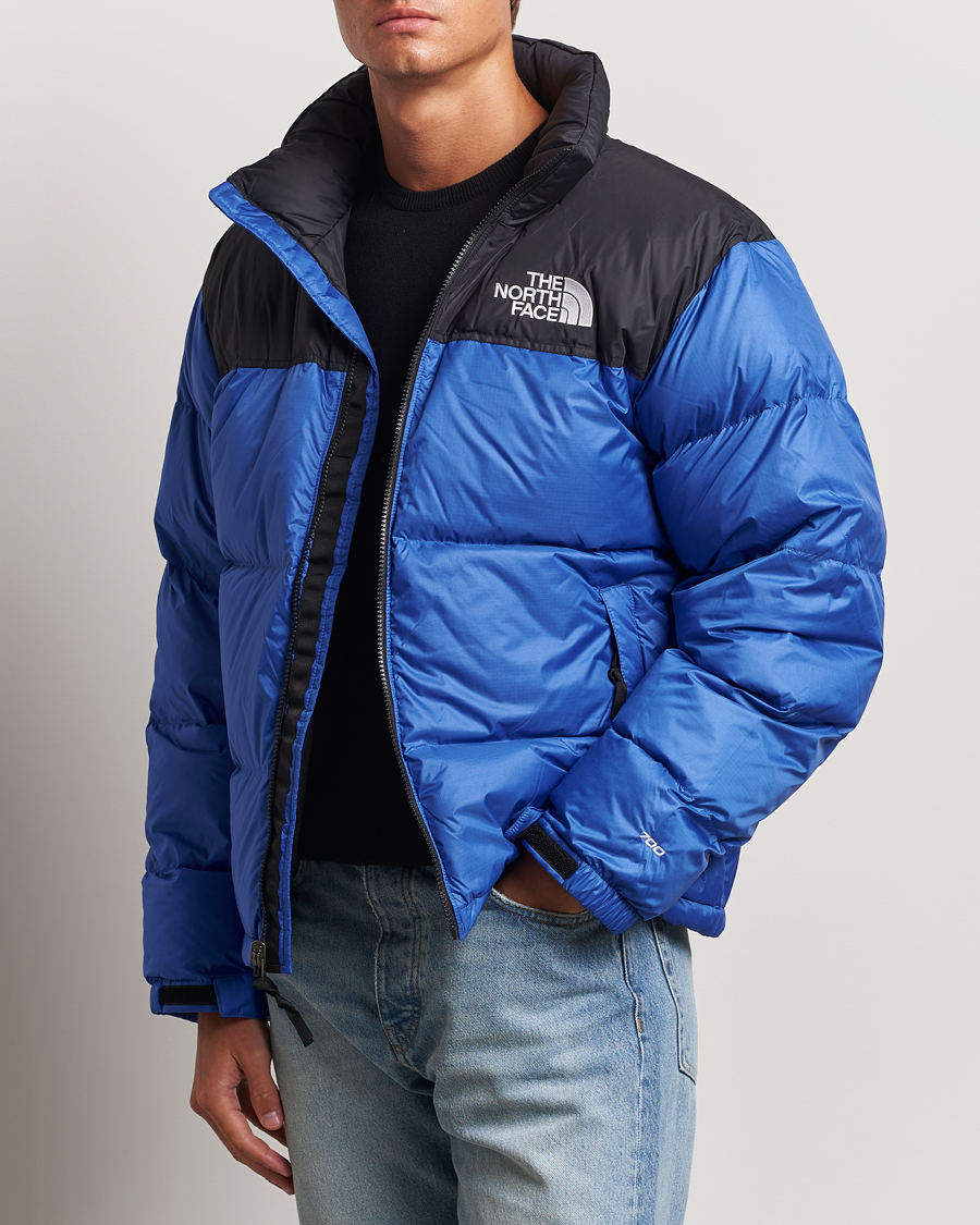 The North Face 1996 Retro Nuptse Jacket Black/Blue bei Care of Carl