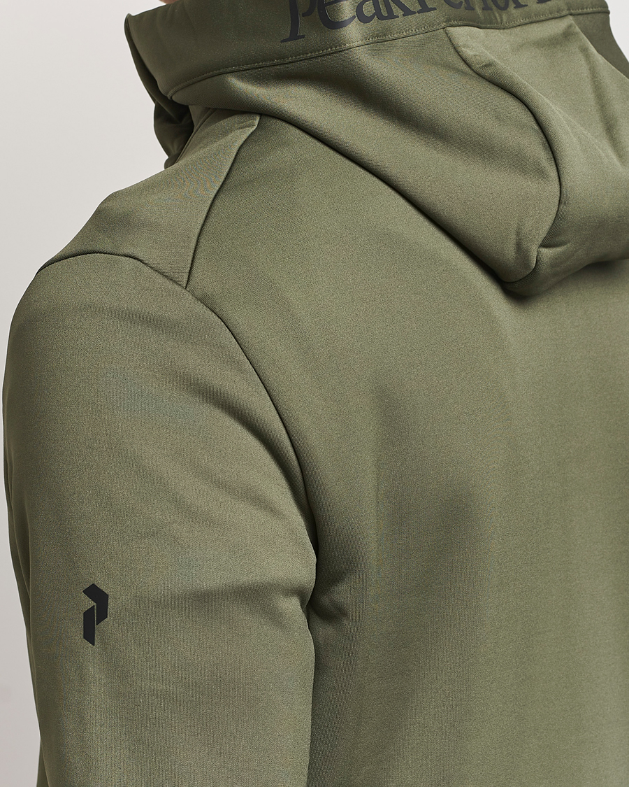 Herren | Pullover | Peak Performance | Rider Tech Zip Hood Pine Needle