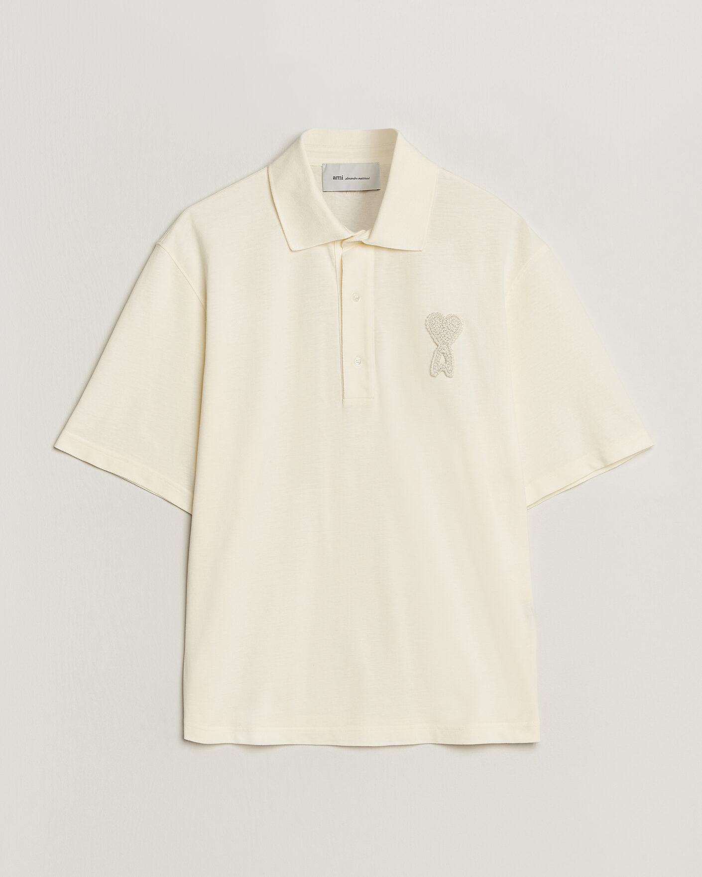 Herren | Poloshirts | AMI | Knitted Heart Logo Polo Creme